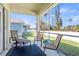 Relaxing screened patio with comfortable seating and views of the landscaped backyard at 8603 46Th Avenue W Cir, Bradenton, FL 34210