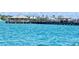 A picturesque pier provides an ideal spot for fishing or sunset viewing, surrounded by calm, shimmering waters at 8603 46Th Avenue W Cir, Bradenton, FL 34210