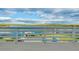 Water view from the deck featuring white wood railings and deck floor at 9061 Kellogg Ln, Venice, FL 34293