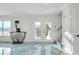 Entryway featuring unique tile flooring and elegant decor at 9061 Kellogg Ln, Venice, FL 34293