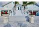 Eye catching entry of this gorgeous home featuring elevated flower pots and grand entry at 9061 Kellogg Ln, Venice, FL 34293