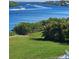 Scenic water view from backyard, with boats cruising along the waterway at 9061 Kellogg Ln, Venice, FL 34293