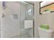 Bathroom featuring a glass enclosed shower with subway tile surround at 410 Mission E Trl # H, Venice, FL 34285
