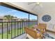 Lanai with table seating and waterfront view at 410 Mission E Trl # H, Venice, FL 34285