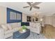 Open concept living room with views of the dining room and kitchen, showcasing an open floorplan at 410 Mission E Trl # H, Venice, FL 34285