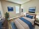 Staged bedroom with window and coastal-themed decorations at 12316 Durango Ave, North Port, FL 34287