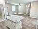Kitchen with an island, ample counter space, and modern stainless steel appliances at 12316 Durango Ave, North Port, FL 34287