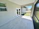 Open and airy screened lanai with views of the lush backyard providing relaxing outdoor living at 12316 Durango Ave, North Port, FL 34287