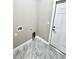 The laundry room offers marble-look floors and essential hookups for modern convenience at 12316 Durango Ave, North Port, FL 34287