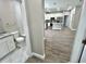 A spacious open-concept living space showcases the easy flow of the kitchen and bathroom design at 12316 Durango Ave, North Port, FL 34287