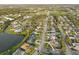 Residential neighborhood with mature trees, ponds, and recreational facilities at 1300 Lucaya Ave, Venice, FL 34285
