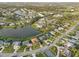 Picturesque residential community with a winding lake and neatly maintained properties at 1300 Lucaya Ave, Venice, FL 34285