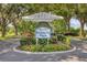 Waterford Berkshire Place community sign surrounded by lush landscaping, offering a welcoming entrance at 1330 Berkshire Ct, Venice, FL 34292