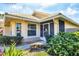 Charming home featuring a tile roof and meticulously landscaped front yard at 1330 Berkshire Ct, Venice, FL 34292