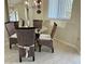 Charming dining area with seating for four and bright light at 1401 S Mccall Rd # 106, Englewood, FL 34223