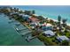 Waterfront property with dock and boat lift provides direct access to the Gulf at 1604 Casey Key Rd, Nokomis, FL 34275