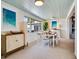Comfortable dining room with artwork and decorations at 1604 Casey Key Rd, Nokomis, FL 34275