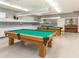 Spacious billiard room with pool tables and ample storage, perfect for community recreation at 199 Palm Harbor Dr, North Port, FL 34287
