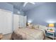 This is a spacious bedroom featuring neutral carpet, ceiling fan, and two closets at 2172 Chenille Ct, Venice, FL 34292