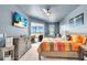 Bright main bedroom with a ceiling fan, balcony access and water view at 2172 Chenille Ct, Venice, FL 34292