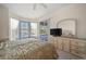 Cozy bedroom with bay windows offering a view of the pool, and a large dresser at 2175 Calusa Lakes Blvd, Nokomis, FL 34275