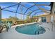 Screened-in pool area with clear blue water, seating, and views of the surrounding landscape at 2175 Calusa Lakes Blvd, Nokomis, FL 34275