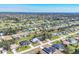 Expansive aerial view of the residential neighborhood with beautiful canals running behind the homes at 221 Mark Twain Ln, Rotonda West, FL 33947