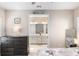 Bedroom view to an en-suite bathroom featuring a double vanity at 228 Caserta Ct, North Venice, FL 34275