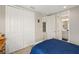 Bedroom featuring a closet and ensuite bathroom providing maximum convenience at 228 Caserta Ct, North Venice, FL 34275