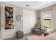 Bright bedroom with a double door closet and window view of the beautiful tile rooftops at 228 Caserta Ct, North Venice, FL 34275