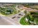 Scenic view of Cielo neighborhood entrance, featuring lush landscaping, water features, and inviting signage at 228 Caserta Ct, North Venice, FL 34275