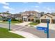 Charming two-story home with a well-manicured lawn, neutral paint, brown garage door and tile roof at 228 Caserta Ct, North Venice, FL 34275