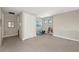 Upstairs hallway showing a small table and chair set plus a closet at 228 Caserta Ct, North Venice, FL 34275