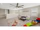 Upstairs loft area offering a large space to hang out with a sofa at 228 Caserta Ct, North Venice, FL 34275
