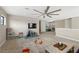 Inviting loft space with carpeted floors, TV, and play area for children at 228 Caserta Ct, North Venice, FL 34275