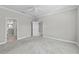 The main bedroom features neutral paint and carpet at 27440 Janzen Ct, Englewood, FL 34223