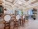 Well-appointed kitchen with a breakfast bar, pendant lighting, and ocean views perfect for entertaining at 2821 Casey Key Rd, Nokomis, FL 34275