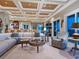 Open-concept living area with bar, ocean views, and easy access to the kitchen at 2821 Casey Key Rd, Nokomis, FL 34275