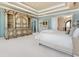 Large main bedroom with white carpet, a king bed and ocean views at 2821 Casey Key Rd, Nokomis, FL 34275