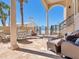Spacious outdoor patio with comfortable seating and view of the ocean at 2821 Casey Key Rd, Nokomis, FL 34275