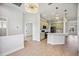 Bright kitchen with open layout, stainless steel appliances, and modern light fixtures at 312 Londonderry Dr, Sarasota, FL 34240
