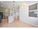 Bright kitchen with stainless appliances, quartz countertops and open floorplan at 312 Londonderry Dr, Sarasota, FL 34240