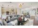 Stylish living area with modern furnishings, an open layout, and a connection to the kitchen and front entry at 312 Londonderry Dr, Sarasota, FL 34240