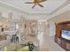 Open floor plan featuring tile flooring connecting the living and dining area at 339 Marsh Creek Rd, Venice, FL 34292