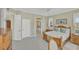 Spacious main bedroom features a large bed, a ceiling fan and an ensuite bathroom at 339 Marsh Creek Rd, Venice, FL 34292