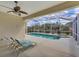 Inviting screened pool and spa offers a relaxing backyard oasis at 339 Marsh Creek Rd, Venice, FL 34292