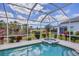 Charming spa and screened pool with serene backyard at 339 Marsh Creek Rd, Venice, FL 34292