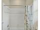 Clean shower area with tiled walls and a shower-tub combo with white fixtures at 339 Marsh Creek Rd, Venice, FL 34292