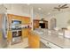 Well-equipped kitchen with stainless steel appliances and a breakfast bar at 4301 Nizza Ct, Venice, FL 34293