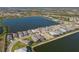 Panoramic aerial view of the community highlighting serene lakes, and lush landscaping at 448 Bocelli Dr, Nokomis, FL 34275